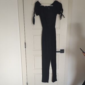 Derek Heart Black Off-Shoulder Tie-Sleeve Jumpsuit with Smocked Waist